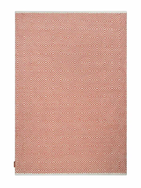 Productfoto van roestoranje vloerkleed met diamantpatroon